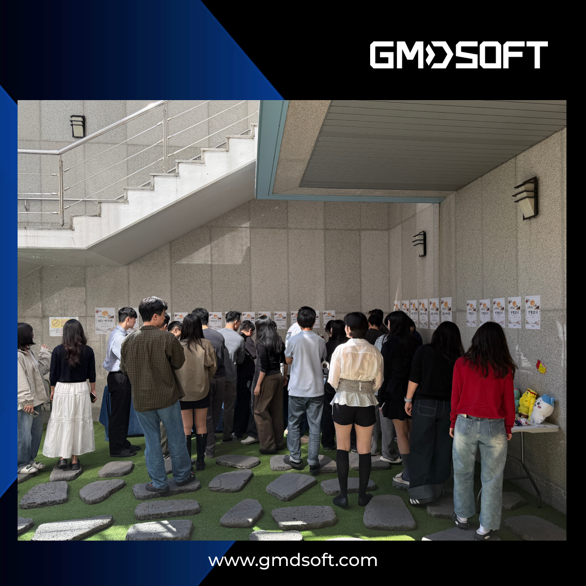 GMDSOFT employees browsing donated items at MD-Bazaar 2026